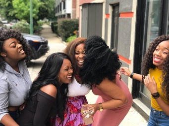 picture of three black women laughing together