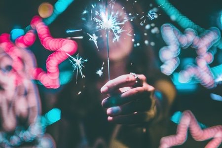 woman holding sparkler