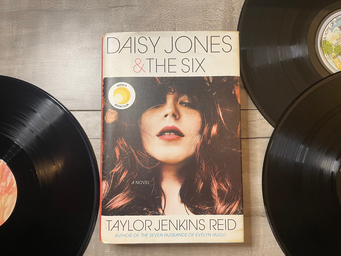 Daisy Jones and The Six book with vinyl records
