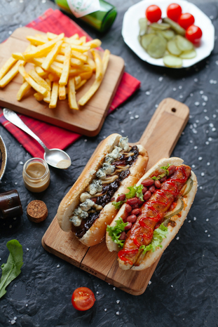 fancy hotdogs on a cutting board shesjpg by Victoria Shes