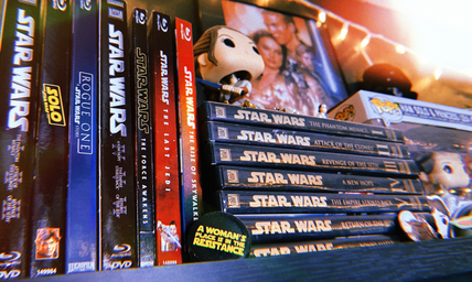 Collection of Star Wars DVDs and memorabilia