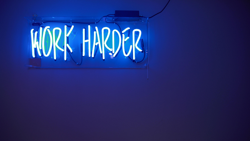 work harder neon sign by Jordan Whitfield on Unsplash