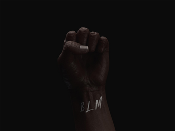 black fist with \"BLM\" written on the wrist set in on a dark background