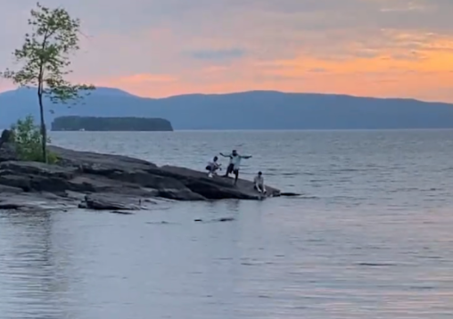 Picture of 99 Neighbors filming a music video on Lake Champlain in Burlington, Vermont.