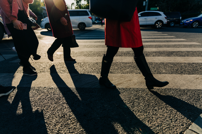 people walking on city street by Steve Long from Unsplash