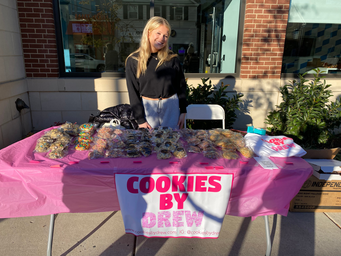 Drew Haas with her cookie table at the event.
