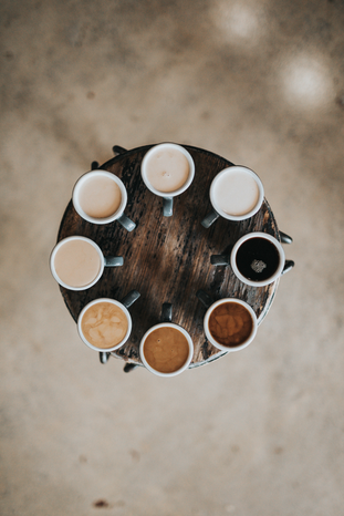 eight cups of coffee dumlaojpg by Nathan Dumlao