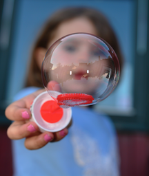 child with bubble