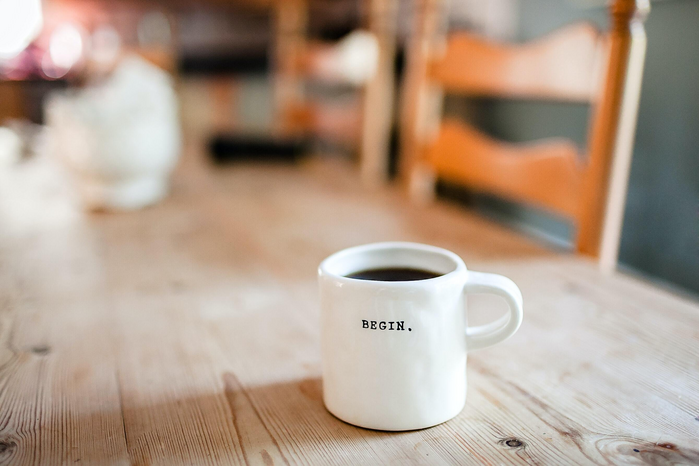 white coffee cup by Unsplash