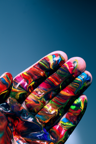 multicolor hand by Unsplash