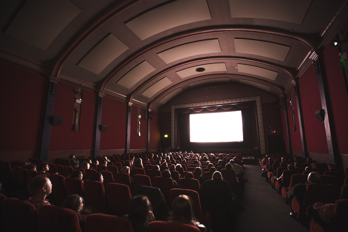 movie theater by Jake Hills on Unpslash