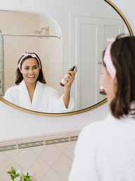Skincare woman in mirror