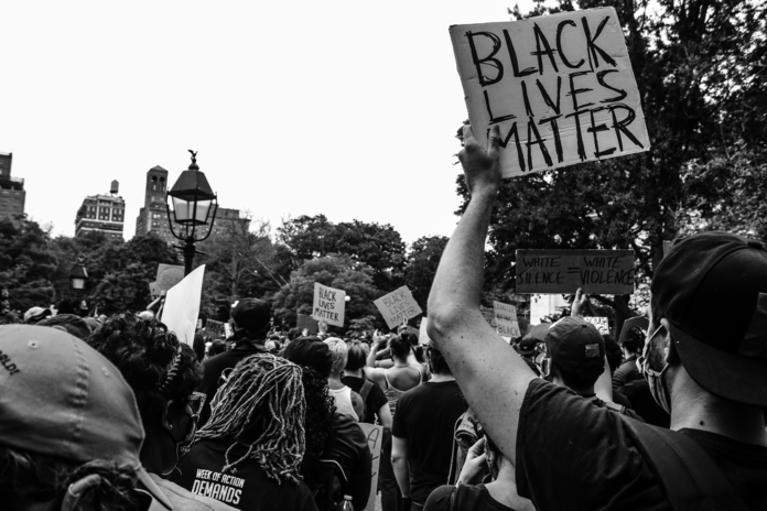 greyscale photo of a Black Lives Matter protest