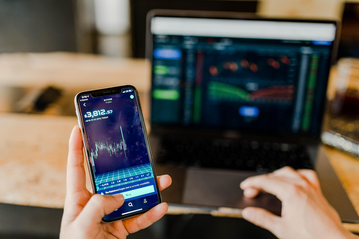 stock market on phone by Austin Distel