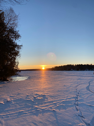 Frozen lake sunset
