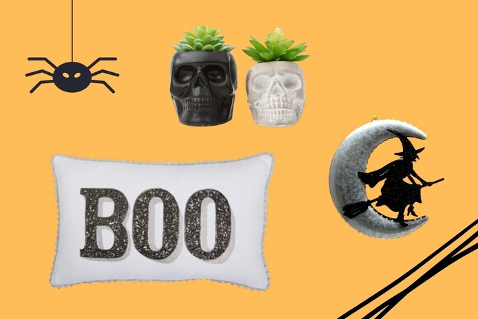 faux skull succulents, boo throw pillow, and witch and moon wall decoration