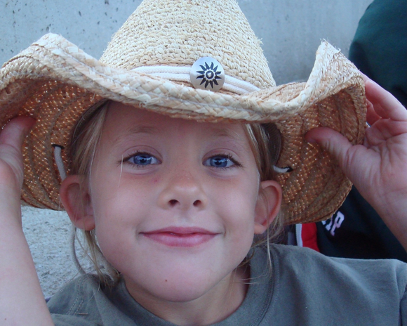 Childhood photo with a cowboy hat