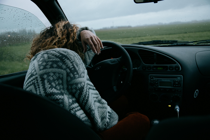 woman in car by Sinitta Leunen from Unsplash