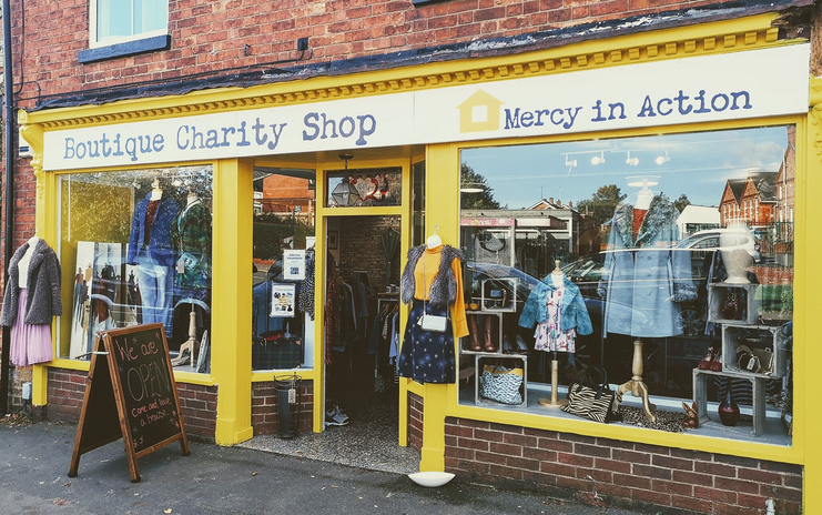 Front of a charity shop- Mercy in Action boutique