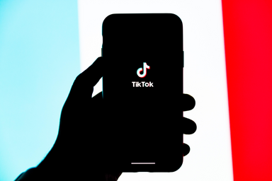 a phone with the TikTok app
