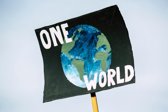 one world signjpg by Markus Spiske