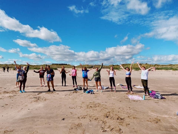 Women at a beach workout by empowHER St Andrews
