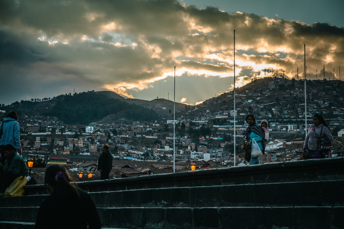 cityscape near a mountain by Adrian Dascal on Unsplash