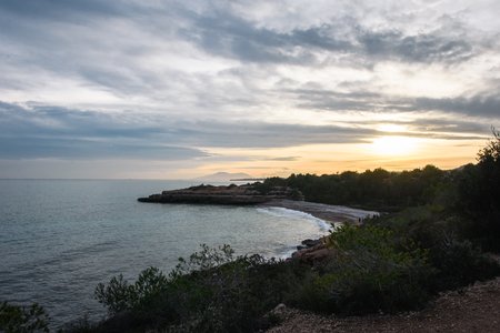 beach spain europe abroad sunset mountain nature trees water mediterranean sea