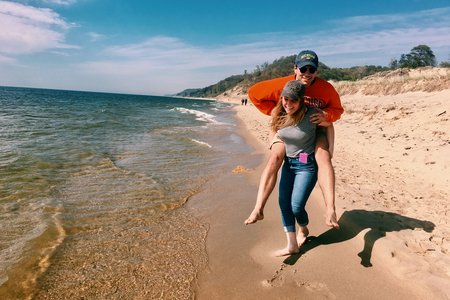 girl boy beach fun sand summer jeans