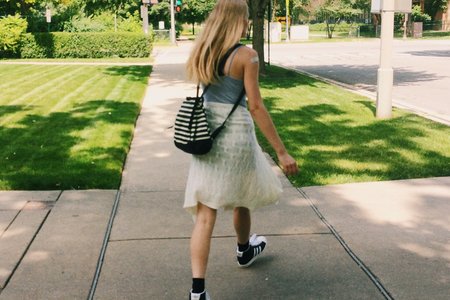 Anna Schultz-Girl Walking With Backpack