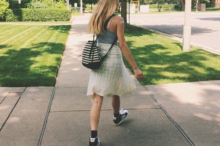 Anna Schultz-Girl Walking With Backpack Sunny
