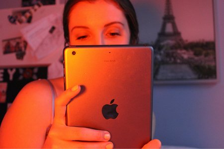 Anna Schultz-Girl Holding Ipad In Bed