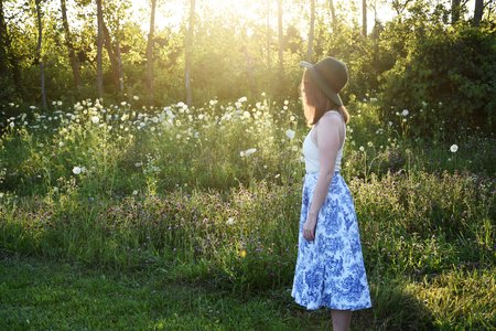 Girl In Porcelain Print Skirt In Feild 1