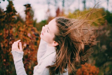 Girl With Hair Blowing In The Wind Fall