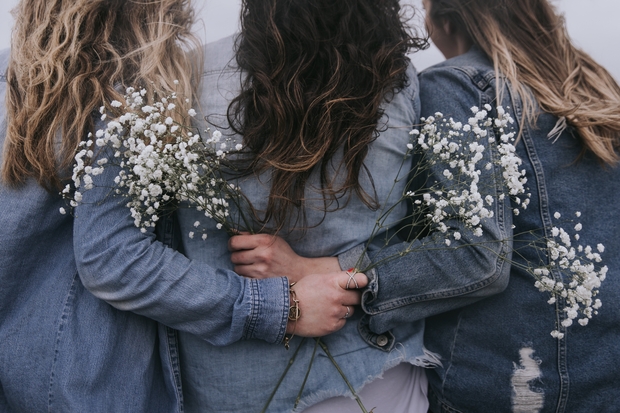 group of women facing backwards
