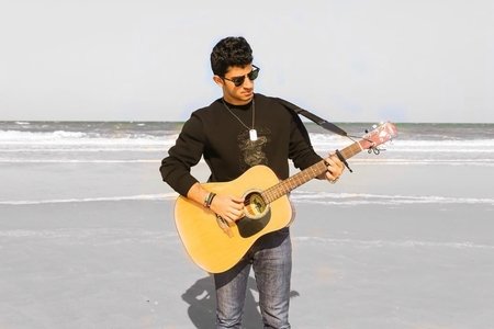 Guy with guitar.