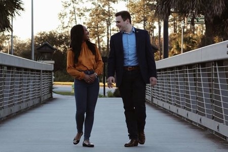woman and man smiling at each other