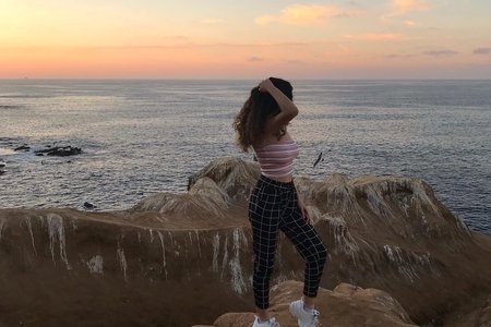 Kristin Ishaya - girl standing on cliff