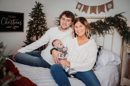 family with baby Christmas photo