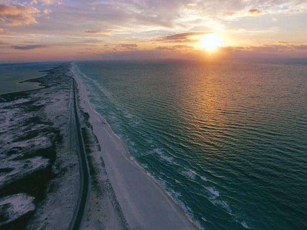 Body of water with sunset