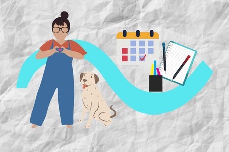 girl and her dog with a calendar, planner, and pens