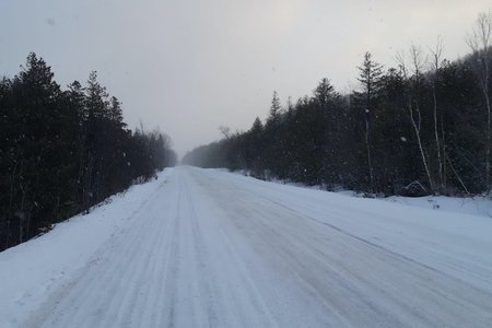 Snowy canadian road in the evening