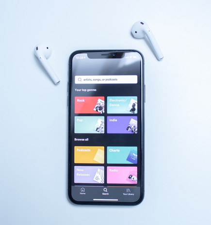 A black phone open to the Spotify app