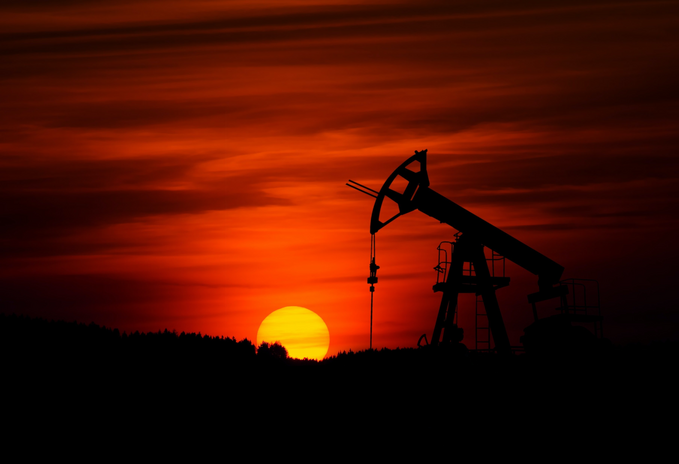 Oil pump in front of a sunset