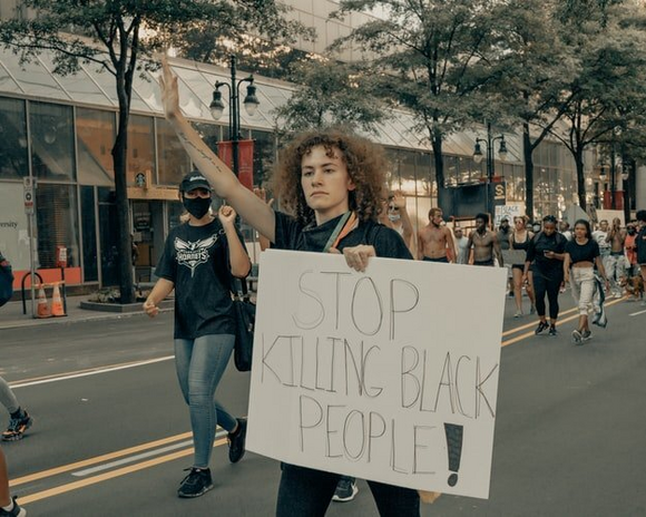 Black Lives Matter protester by Clay Banks