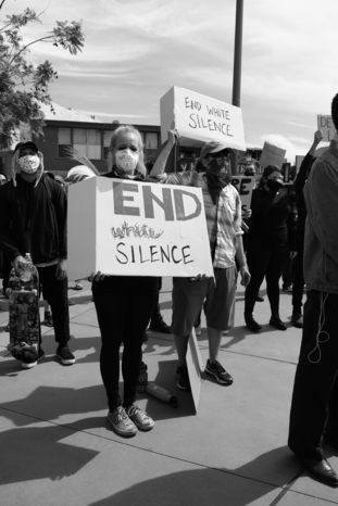 End white silence sign by Mike Von