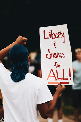 liberty and justice for all protest sign