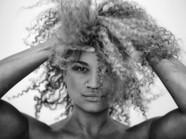 Woman with curly hair- black and white photo