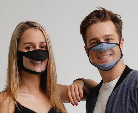 Boy and girl with smile mask