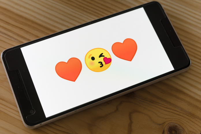 flirty emojis on black smartphone